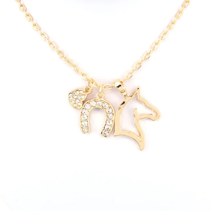 Gold horse head pendant
