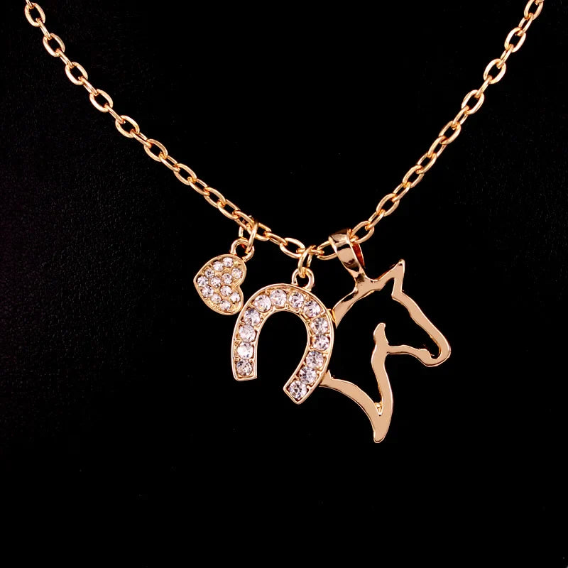 Gold horse head pendant