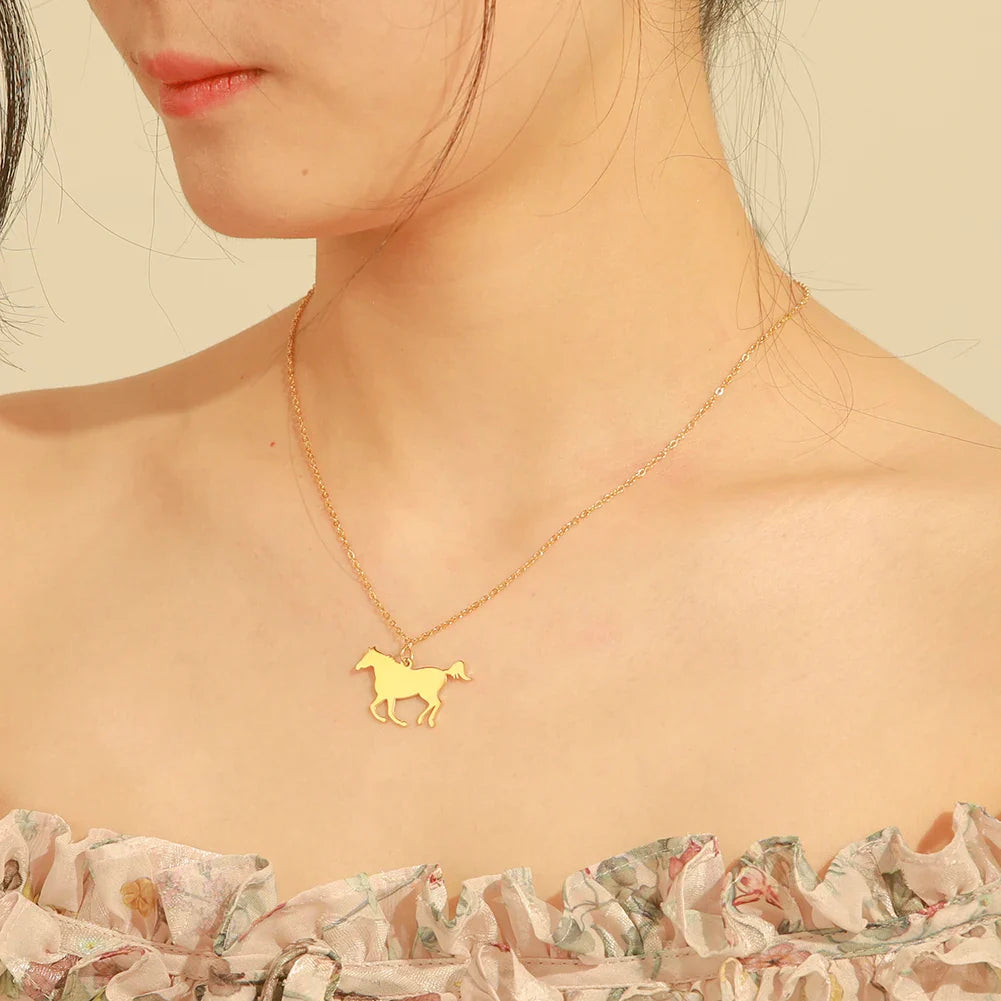 Gold horse charm necklace