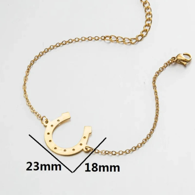 Gold horse shoe bracelet
