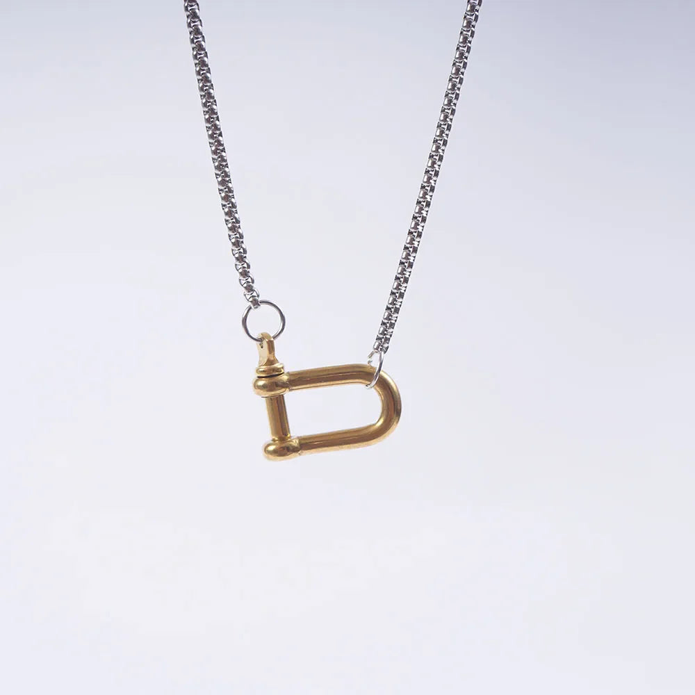 Tiny gold horseshoe necklace