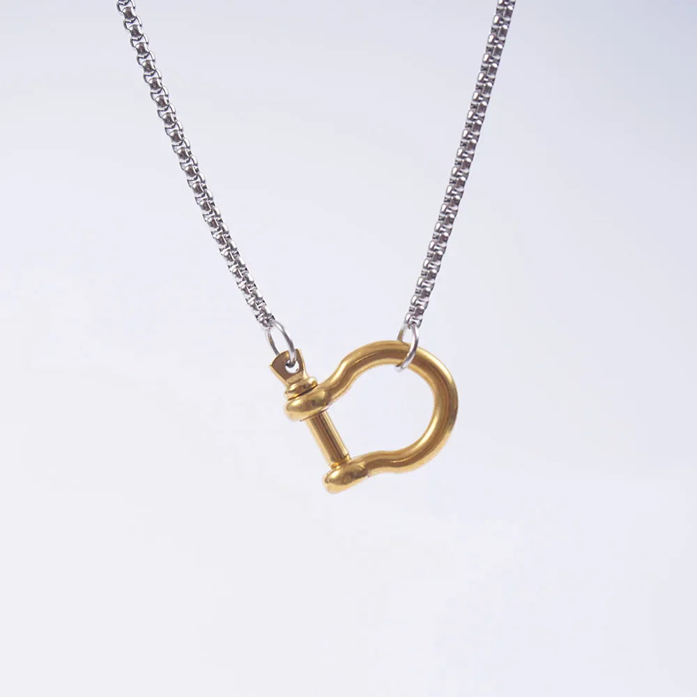 Tiny gold horseshoe necklace
