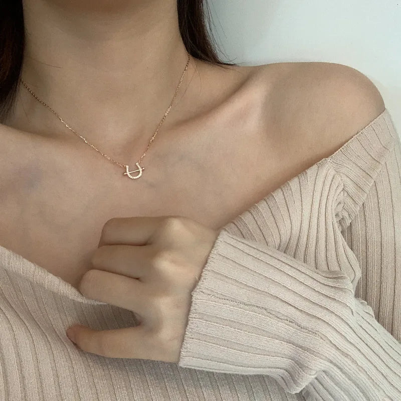 Tiny horseshoe necklace