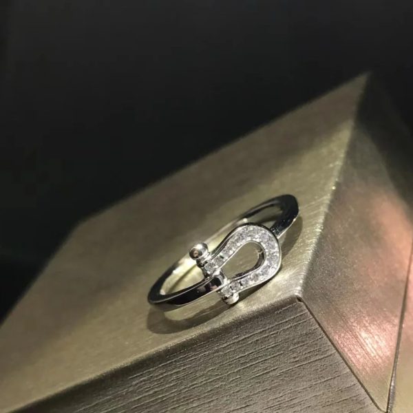 Ring with horseshoe